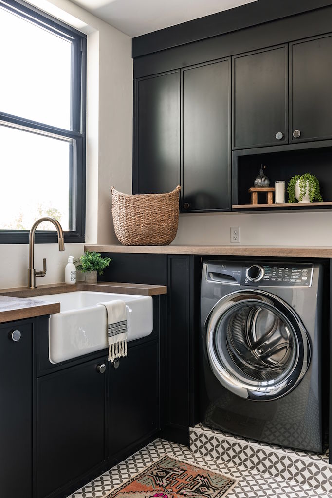 Rich Black Cabinetry in our Summit Creek Project Laundry Room - Becki ...