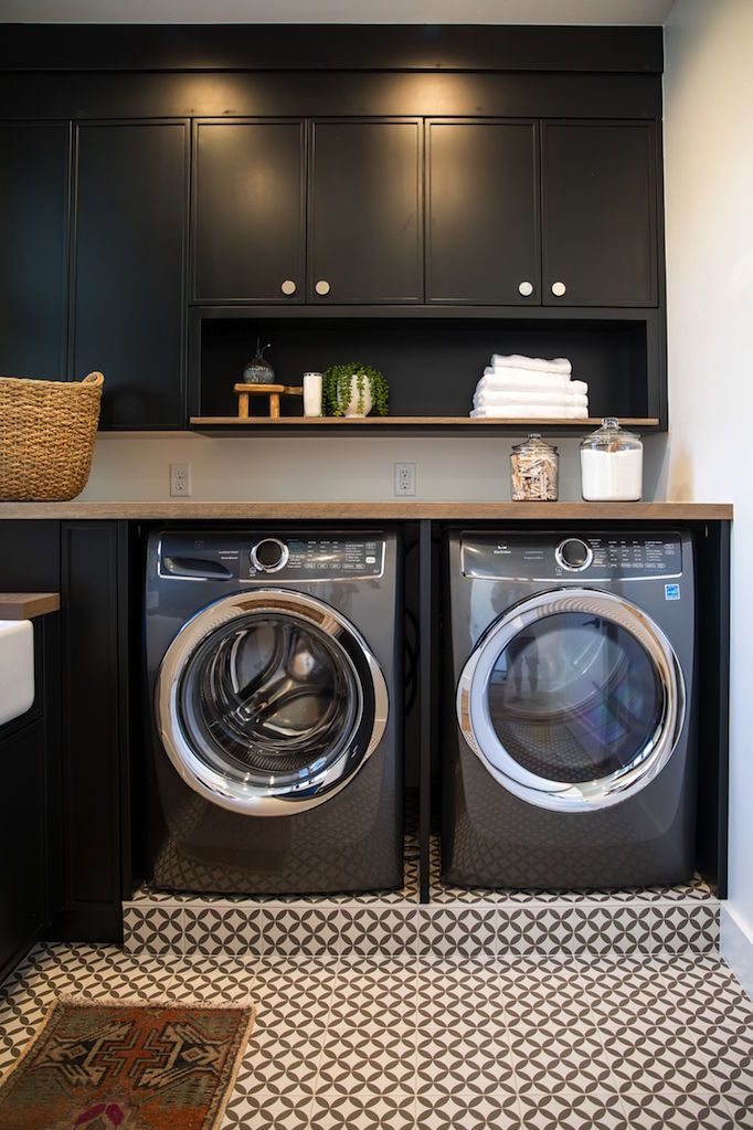 Rich Black Cabinetry in our Summit Creek Project Laundry Room - Becki ...